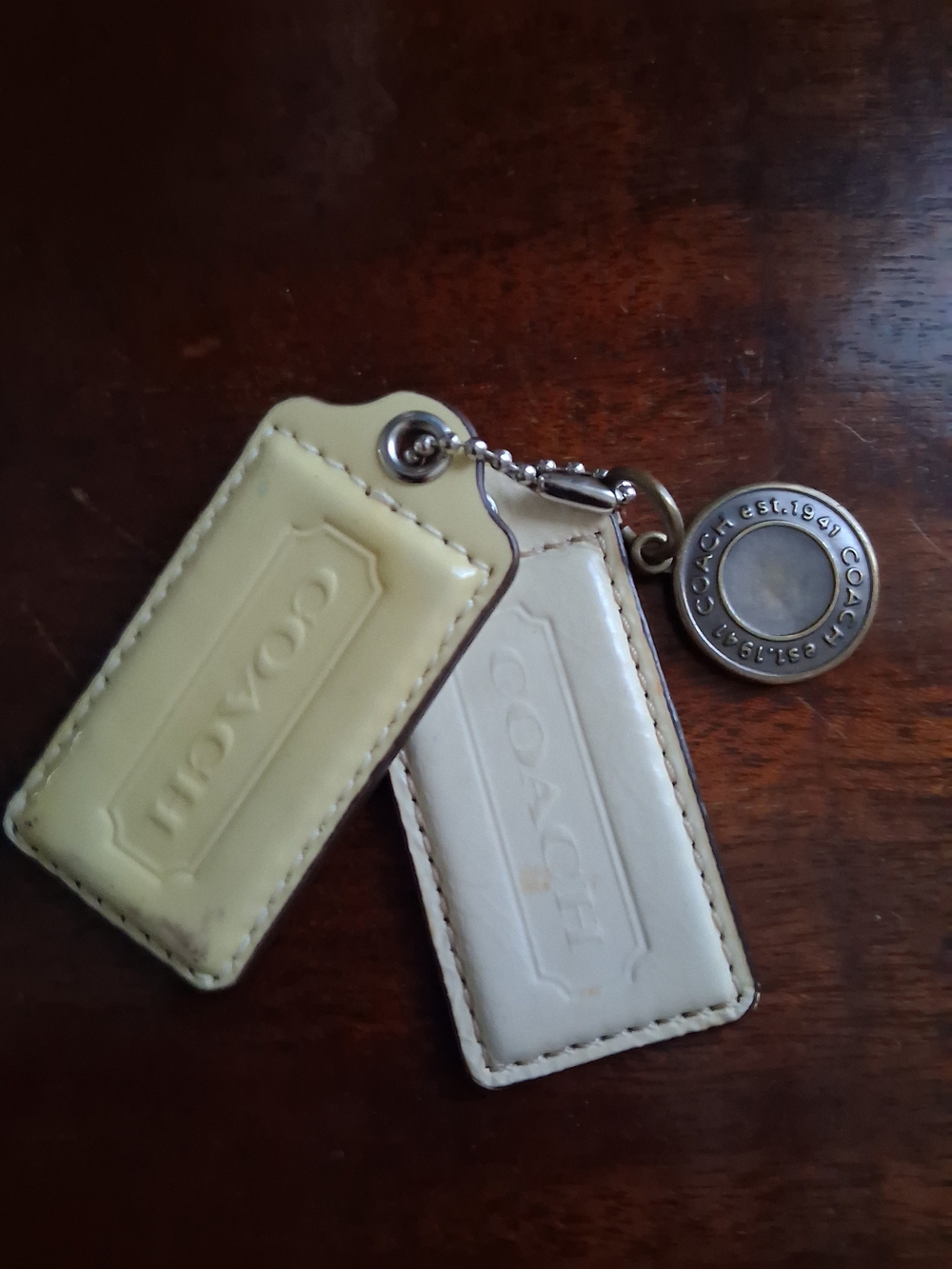 Coach Double Leather Tag Keychain in Cream and Pale Yellow